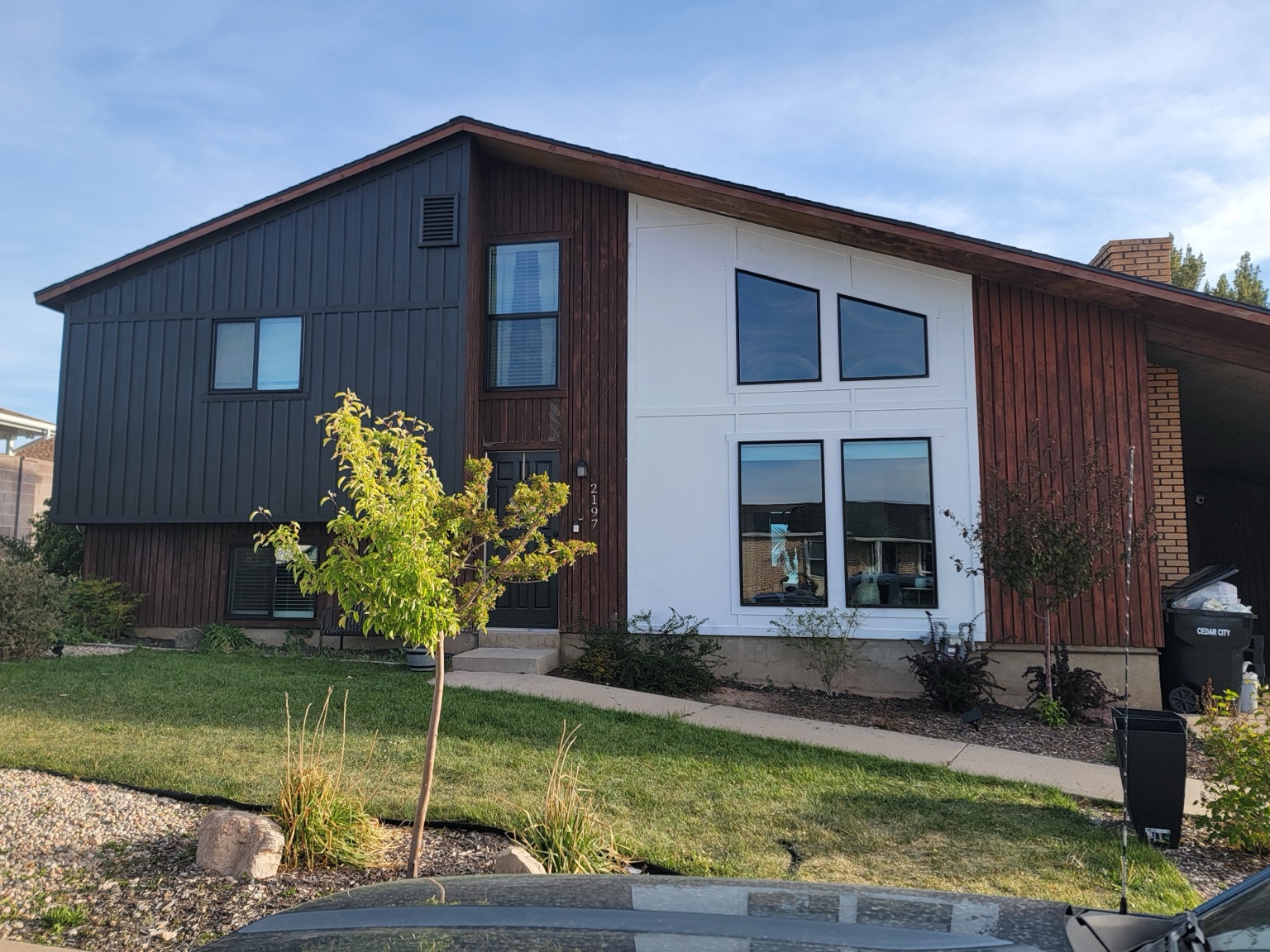 Updated front siding in white and charcoal