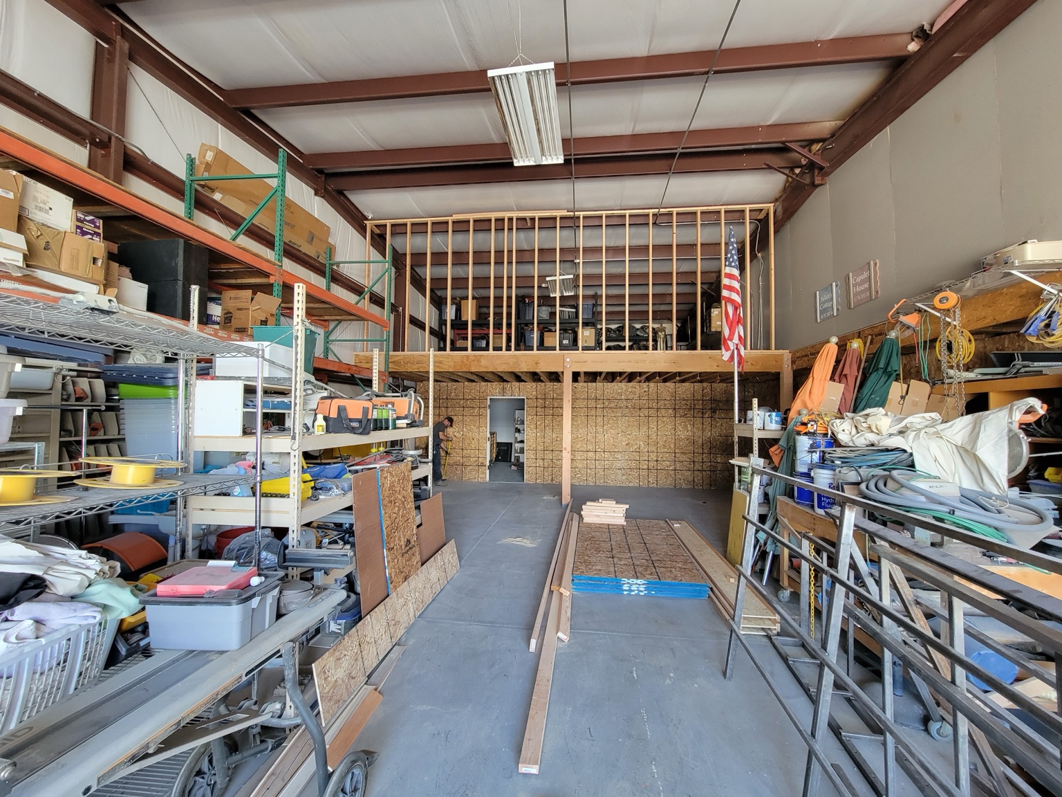 Shop loft and partition framing with wall sheathing